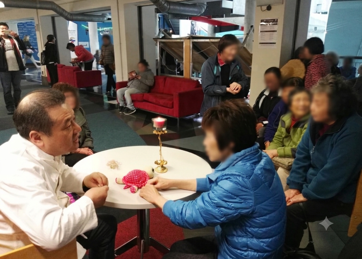Levi Zhu speaking with a patient during a community consultation